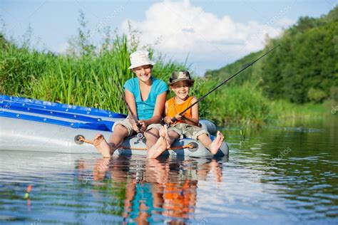 Kids Fishing At The River — Stock Photo © Macsim 64670849
