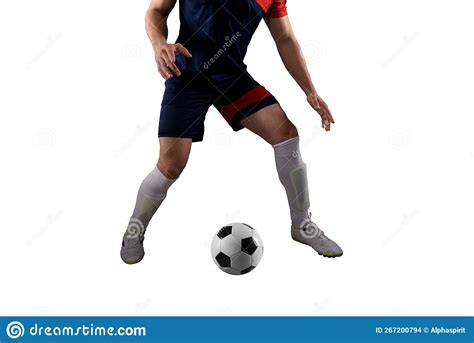 Close Up Of A Football Action Scene With Soccer Player Chases A