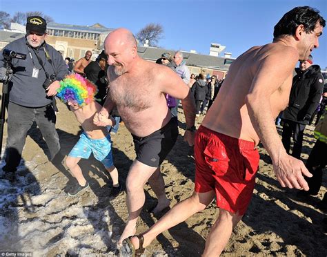 Thousands Ring In The New Year With Annual Polar Bear Plunge Tradition Daily Mail Online