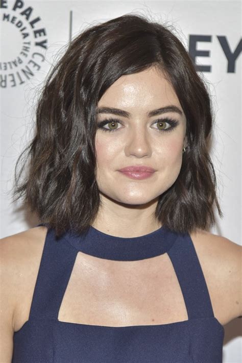 If you have long tresses, consider wearing them down just like lucy does. Lucy Hale Wavy Dark Brown Bob Hairstyle | Steal Her Style