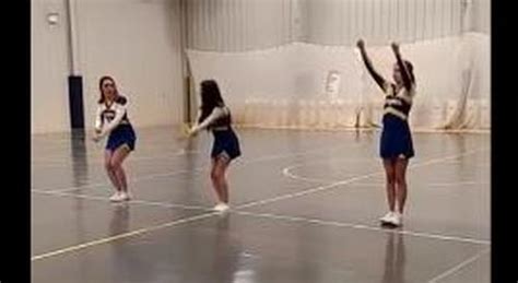 Cheerleaders Confused When Teammate Takes Off Screaming Mid Routine Until She Sprints For Door