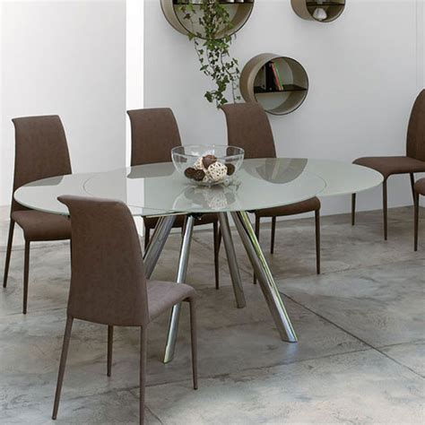 We understanding that buying one is a big investment. Peressini Myles Extending Glass Dining Table