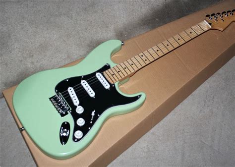 Light Green Electric Guitar With Black Pickguard3s White Pickupsmaple