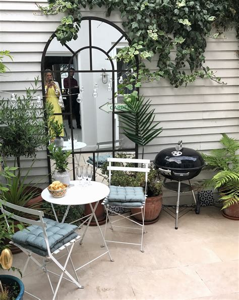 How To Style Small Spaces Courtyard Gardens The Frugality