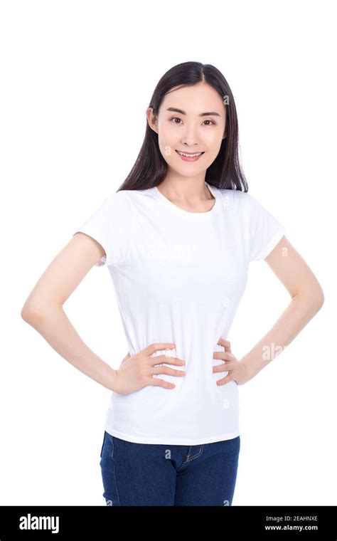 Woman Standing With Hands On Hips And Looking At Camera Isolated On White Stock Photo Alamy