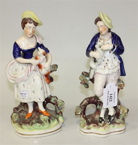 A Pair Of Staffordshire Pottery Figures Late 19th Century Modelled As