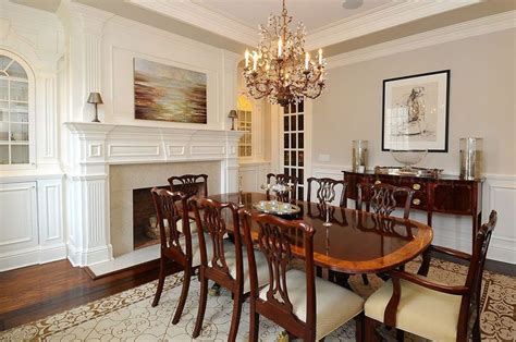 Traditional Dining Room With Fireplace And Chandelier Dining Room