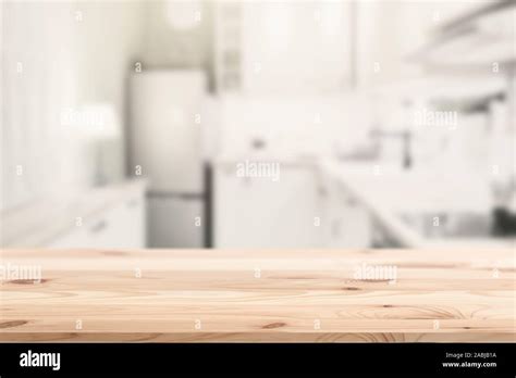 Wooden Table Top Island With Blur Kitchen Home Background For Products