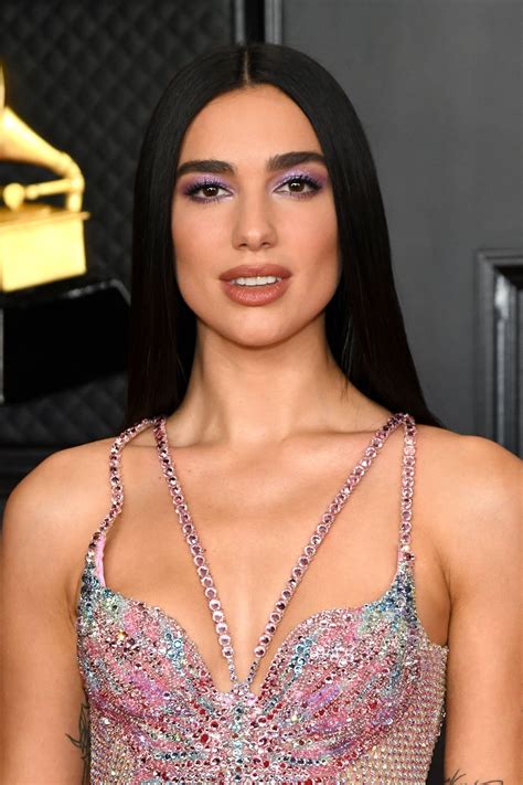 Dua Lipa Dares To Bare It All In Atelier Versace At The Grammys
