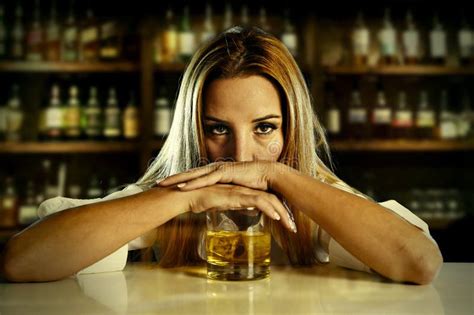 Drunk Alcoholic Woman Wasted Drinking On Scotch Whiskey In Bar Stock