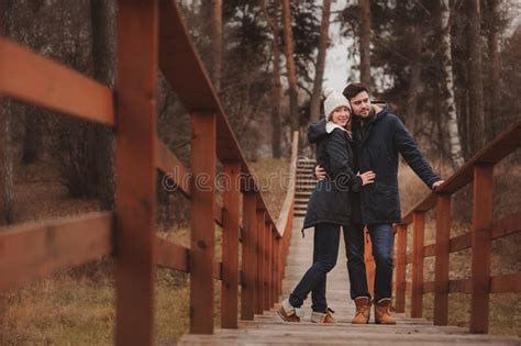 Loving Young Couple Happy Together Outdoor On Cozy Warm Walk In Forest