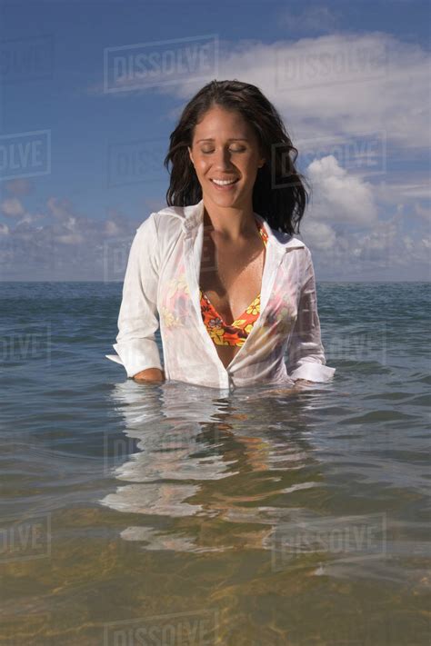 Pacific Islander Woman Standing In Waist Deep Water Stock Photo Dissolve
