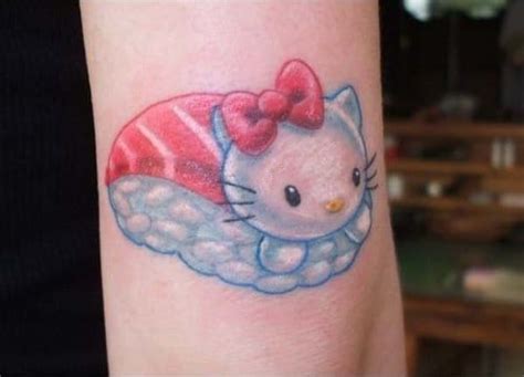 Hello Kitty Tattoo On Arm By Stacey Martin