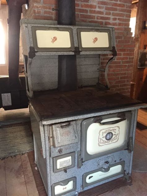 Antique Home Comfort Wood Burning Cook Stove Wrought Iron Range Company