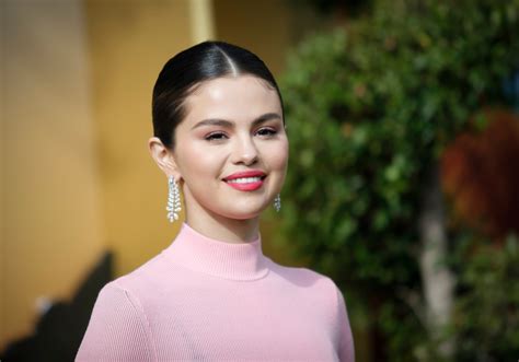 Selena Gomez Wore A Sultry Strapless Dress With A Super High Slit To