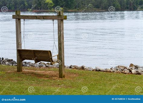 Wooden Swing Out Along Lake Murray Stock Photo Image Of Cloudy