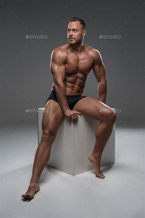 Naked Handsome Bodybuilder Dressed Only In Black Shorts Stock Photo By