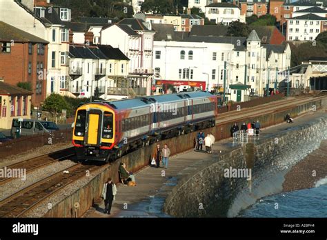 West Bound Passenger Train Passing Through The Devonshire Seaside