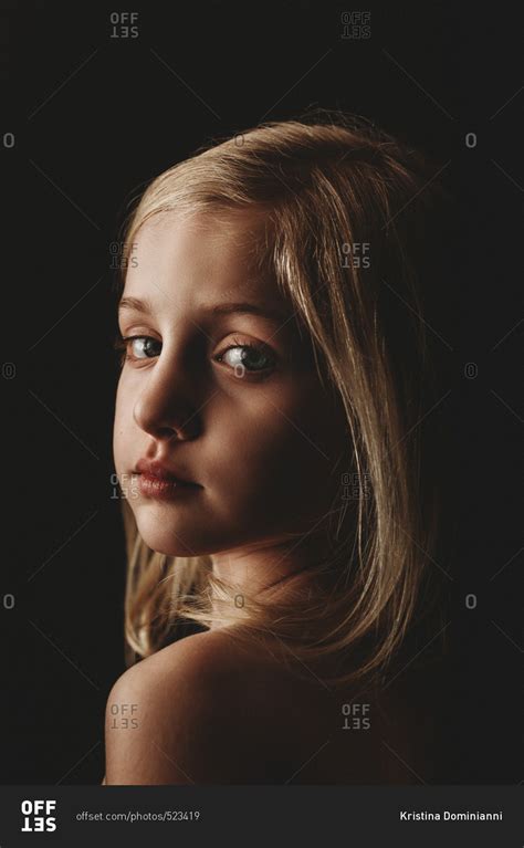 Blonde Little Girl Looking Over Her Bare Shoulder Stock Photo Offset