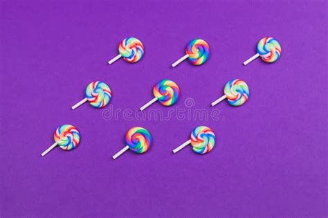 Colorful Candies Lollipops Isolated On Purple Background Festive