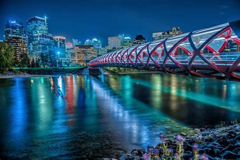 Time Lapsed Photography Of Bridge With River Peace Bridge Calgary
