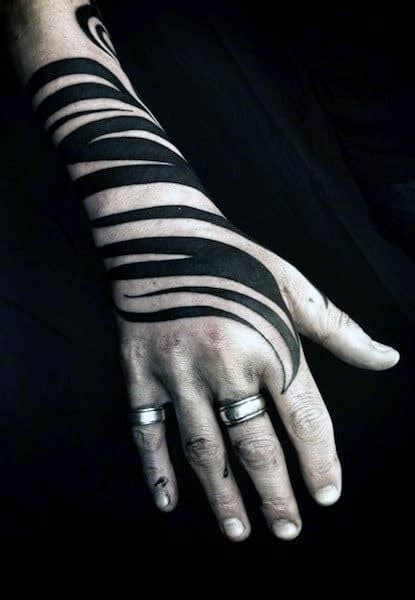 40 Tribal Hand Tattoos For Men Manly Ink Design Ideas
