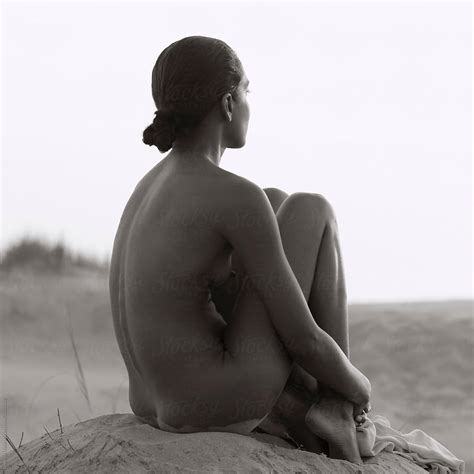 Nude Woman Sitting On Beach Del Colaborador De Stocksy Rene De Haan