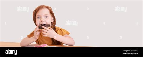 Little Girl Eating Round Doughnut Sweet Desert Unhealthy Food Stock