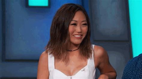 karen fukuhara shrug by team coco find and share on giphy