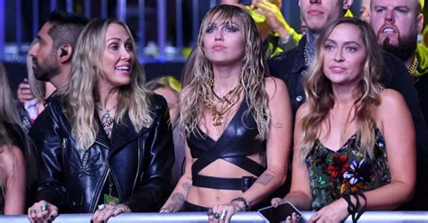 Miley Cyrus Lookalike Sister Brandi Dupes Instagram In Sports Bra