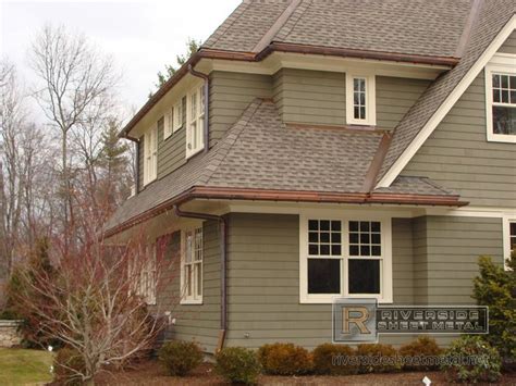 We've already covered black home exteriors, so we're flip the switch and see what a home can look like tan house house roof black house exterior paint colors exterior design house gutters how to install. copper gutters | Copper gutters, downspouts and valleys ...