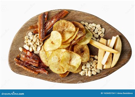 Assorted Snacks Chips Nuts Dried Fish And Smoked Cheese Appetizing