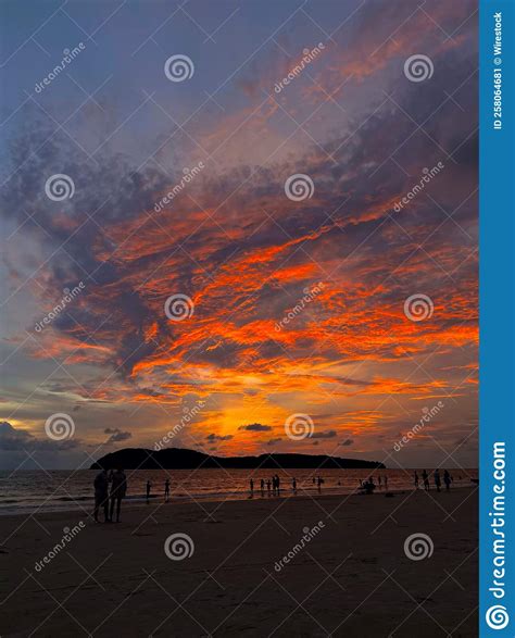 Vertical View Of A Beautiful Sunset At Pantai Cenang Beach Langkawi