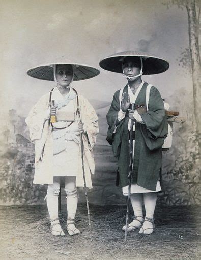 Two Travelers With Staffs Wearing Hats Studio Portrait Free Public