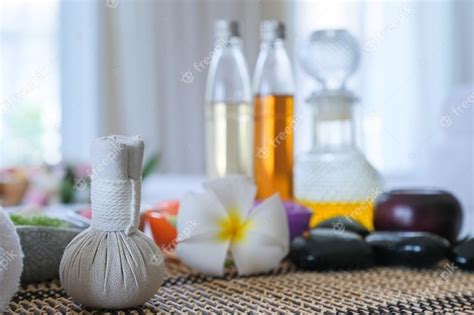 Premium Photo Spa Treatment Set And Aromatic Massage Oil On Bed