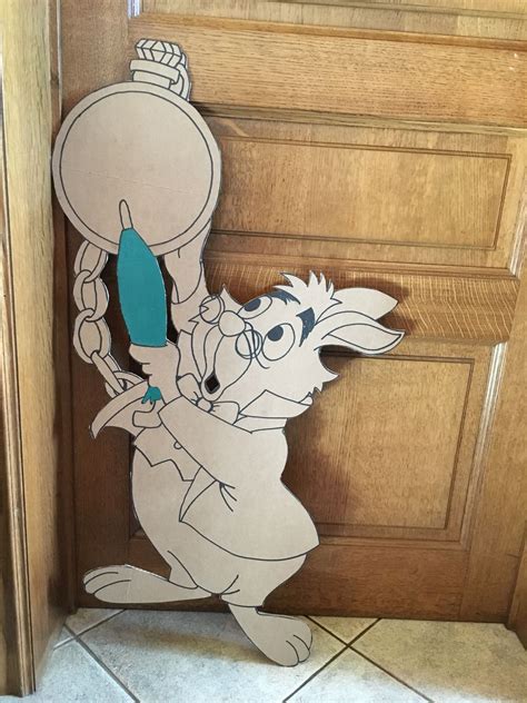 Our daughter wanted an alice in wonderland party so here are the decorations we made. Alice in wonderland Rabbit- i'm late! Diy Cardboard Party | Alice in wonderland decorations ...