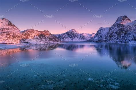 Aerial View Of Snow Covered Mountain Aerial View Colorful Sunset
