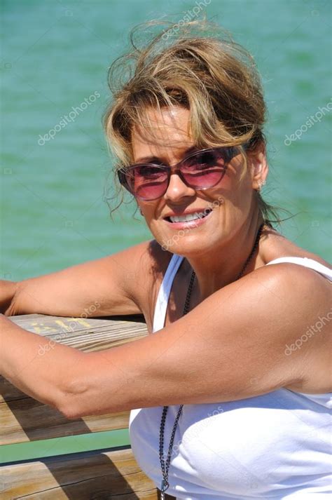 Attractive Woman On Beach Boardwalk Stock Photo By Eyemark