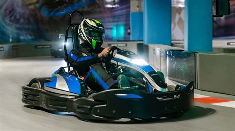 Suited up with safety helmets and jumpsuits. UAE's First E-karting Centre Is Open Now - General info ...