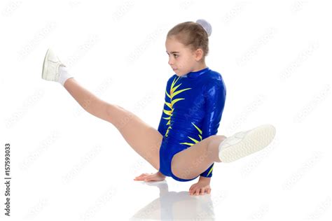 A Girl Gymnast Performs Exercises On The Floor Stock Photo Adobe Stock