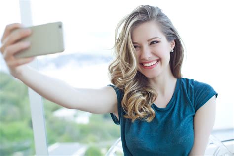 Woman Doing Selfie Phone Capital Smiles Blog