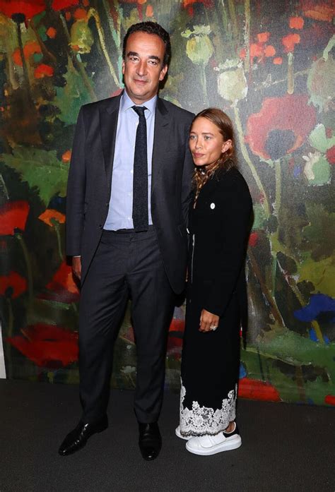Mary Kate Olsen And Husband Olivier Sarkozy Make Rare Appearance