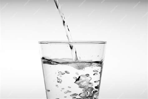 Premium Photo Close Up Pouring Drinking Water Into Glass