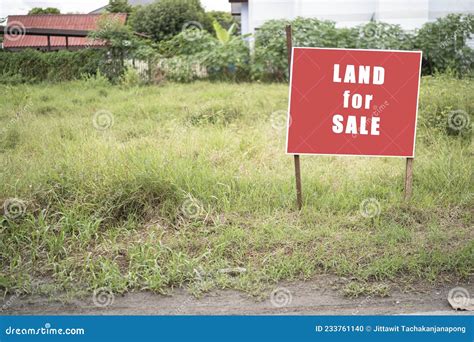 Land For Sale Sign Red Sign For Sale Plot Green Lawn Behind Sign