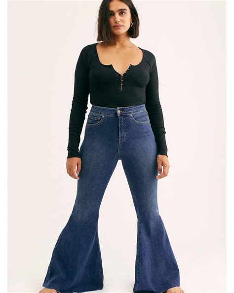 Free People Crvy Super High Rise Lace Up Flare Jeans In Blue Lyst