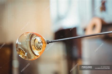 Close Up Of A Molten Glass On Blowpipe At Glassblowing Factory — Manufacture Craft Stock