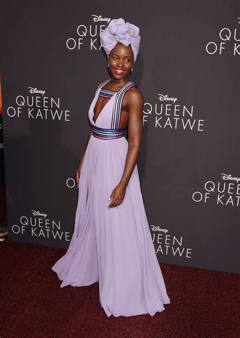 Lupita Nyongo Delivers A Royal Fashion Moment In Stunning Purple Gown