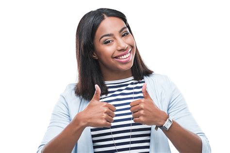 Happy Young African American Woman Showing Thumbs Up And Smiling At