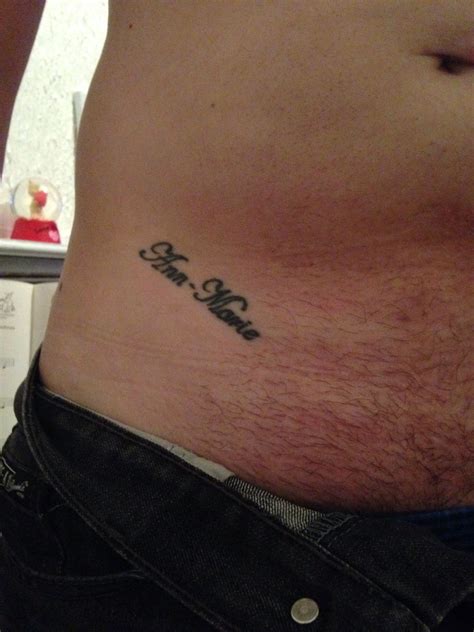 wife s name tattoo on hip pelvis
