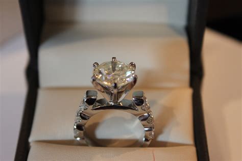 Https://tommynaija.com/wedding/6 Carats Of Diamonds On Wedding Ring